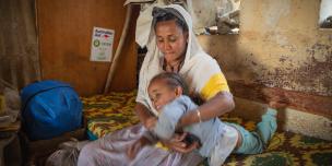 Netsanet, a participant in the Oxfam support program spending time with her daughter at their makeshift home in Tigray, Northern Ethiopia. Photo credit: Petterik Wiggers/Oxfam Netsanet, a participant in the Oxfam support program spending time with her daughter at their makeshift home in Tigray, Northern Ethiopia. Photo credit: Petterik Wiggers/Oxfam