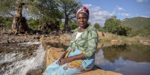 Sarah checks the water level at Nyanyadzi river, Zimbabwe. She has been farming for 25 years. "A lot has changed since I started farming. The rain now comes late". Photo credit: Cynthia Matonhodze/Oxfam Sarah checks the water level at Nyanyadzi river, Zimbabwe. She has been farming for 25 years. "A lot has changed since I started farming. The rain now comes late". Photo credit: Cynthia Matonhodze/Oxfam