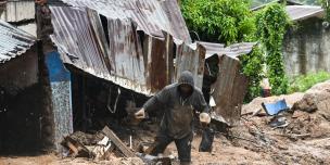A man in Chilobwe Township in Blantyre picking something from the rubble of his house after mudslides, heavy rains and winds destroyed it. Photo credit: Thoko Chikondi/ Oxfam A man in Chilobwe Township in Blantyre picking something from the rubble of his house after mudslides, heavy rains and winds destroyed it. Photo credit: Thoko Chikondi/ Oxfam
