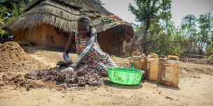 Nyalok, single mother of two and living as a refugee with a disability from a past accident, fled the turmoil of South Sudan in 2014. In Gambella, she is now making improvements to the small hut which she and her family calls home. Photo credit: Petterik Wiggers/ Oxfam Nyalok, single mother of two and living as a refugee with a disability from a past accident, fled the turmoil of South Sudan in 2014. In Gambella, she is now making improvements to the small hut which she and her family calls home. Photo credit: Petterik Wiggers/ Oxfam