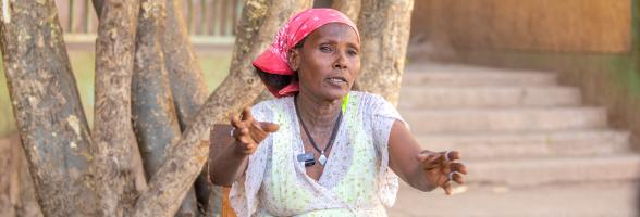 50 year old Hareyat Gebrelibanos and a mother of four from Tigray in Northern Ethiopia cleaning mitad* traditional griddle used for cooking bread at Meles IDP camp. Photo Credit: Zerubabel Tore/Oxfam