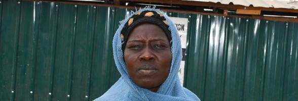 Bibiana Peter a mother of five lives with her children at an old transit centre. Photo credit: Yangi Justine/ Oxfam