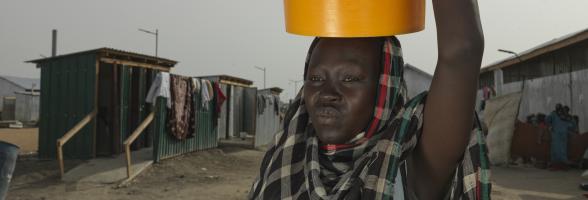 Achol Ring Tong Longar, 21 after arriving at the South Sudan border from war torn Sudan. Credit: Peter Caton/Oxfam