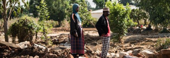 Twaibu Aufi and his wife 49-year-old wife Stevelia Aufi are seen on what used to be their house in the aftermath of Tropical Cyclone Freddy in Phalombe southern Malawi on Friday 24 March 2023. CREDIT: Thoko Chikondi / Oxfam