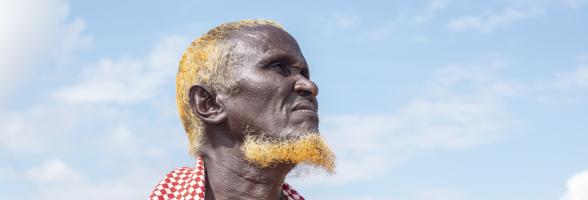 Hamud Mohamed Mumin from Tulatula (Kenya) who received cash transfer from Oxfam gives his goats water. 