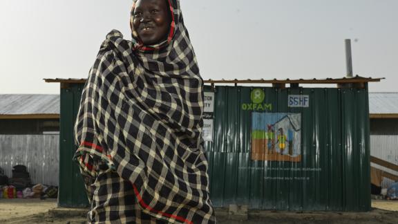 Achol Ring Tong Longar, 21 after arriving at the South Sudan border from war torn Sudan. Credit: Peter Caton/Oxfam
