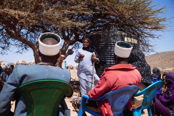 Darare Gonche Saldesa meets with community members in Horonder village, in Marsabit County in northern Kenya.