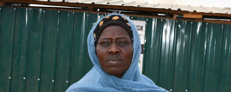Bibiana Peter a mother of five lives with her children at an old transit centre. Photo credit: Yangi Justine/ Oxfam