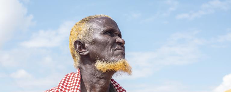 Hamud Mohamed Mumin from Tulatula (Kenya) who received cash transfer from Oxfam gives his goats water. 