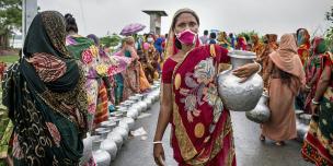 Women in Bangladesh gathering water after Cyclone Amphan Women gathering water after cyclone amphan