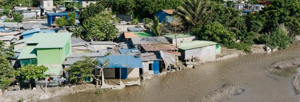 Houses alongside the Comoro river in Dili.