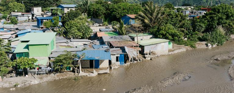 Houses alongside the Comoro river in Dili.