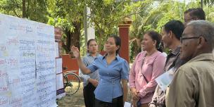 Series of presentation by representatives of the Commune Councilor and Commune Committee for Women and Children's on 2026 Commune Budget Package covering commune fund revenue sources, budget expenditure allocations, and priority activities and action plans.