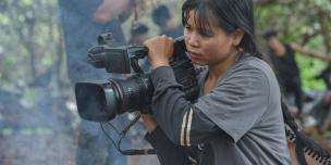 Rady Sa and her team filming the life of her community to raise awareness about gnder-based violence. ©Bophana Center