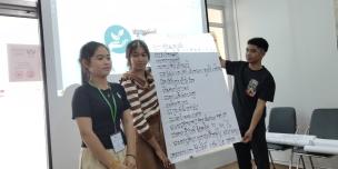 Chenda presenting the skills she gained duirng her time volunteering with Live & Learn Cambodia