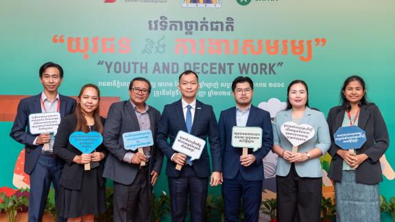 Honorable guests gather for a group photo during the national forum on Youth and Decent Work