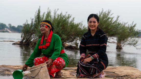 Indigenous community relying on the river for daily life. Indigenous community relying on the river for daily life.