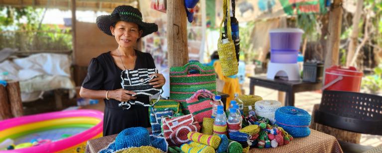 Sitha Mut, 42, is proud to share the souvenir items made from plastic waste in her showroom center, Sangkat Chreav, Siem Reap province. 