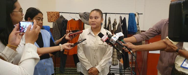Sreypov Thel provided an interview to the media during a national dialogue on Better Protection for Worker and Farmer in Rubber and Banana Value Chains