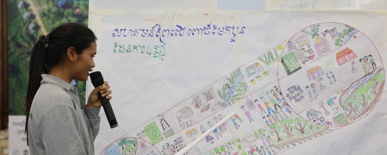 A representative from Por Maen Boun Community Forestry presents their newly developed four-year forest management plan—now infused with gender equity principles using the GALS Tool. The plan, shaped during the three-day training, reflects a stronger commitment to inclusive governance and sustainable stewardship. Photo: Botom Mune/Oxfam