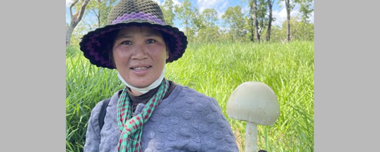 Ms. Sina Bin showing the mustroom she just collected from the forest. Photo: Kongden Phoek/VSG