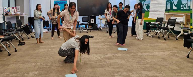 Participants worked together in a team building problem-solving activity that was called “Boat racing.” Photo: TPO