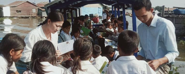 The students enjoy reading books on the library boat.