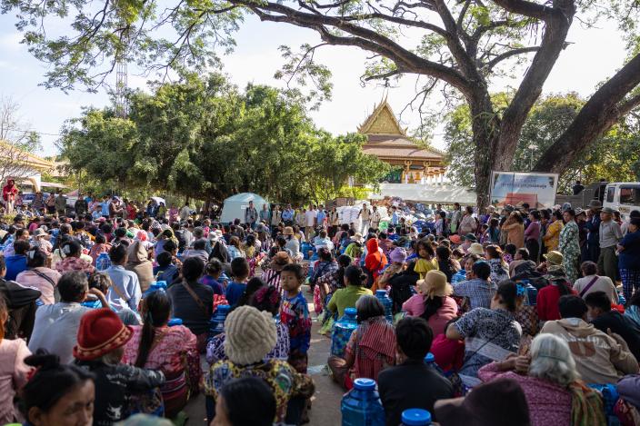 Displaced families gather in large numbers as they wait for the distribution of dignity kits provided by Oxfam, part of ongoing humanitarian efforts to support communities in crisis.