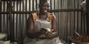 Rose Wasiaya, 39, at her chapatti business in Korogocho, an informal settlement in Nairobi, Kenya. Photo Credit: Katie G. Nelson/Oxfam