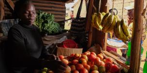 Mary Kwamboka in her kiosk. Photo Credit: Allan Gichigi