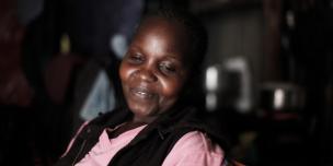 Grace Ondieke, a mother of 3, sits in her house in Mukuru informal settlement, in Nairobi, Kenya. Photo Credit: Sam Tarling Grace Ondieke, a mother of 3, sits in her house in Mukuru informal settlement, in Nairobi, Kenya. Photo Credit: Sam Tarling