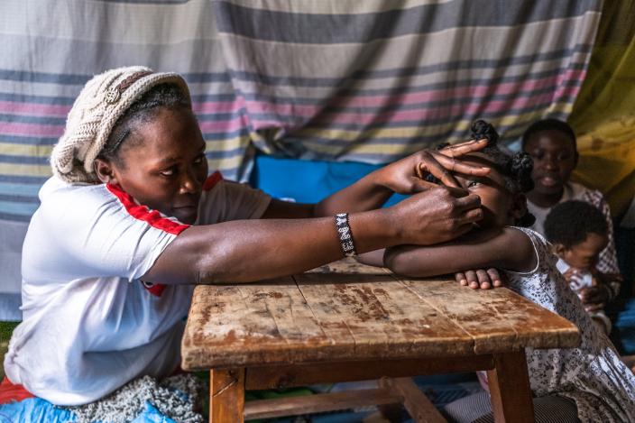 Mildred Lucia's plays with her daughter | Photo by Brian Otieno/ Oxfam in Kenya