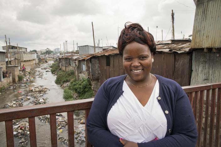 Doreen Muthoni, 38, a small scale trader, in Mukuru, an informal settlement in Nairobi, Kenya. Photo Credit: Katie Nelson