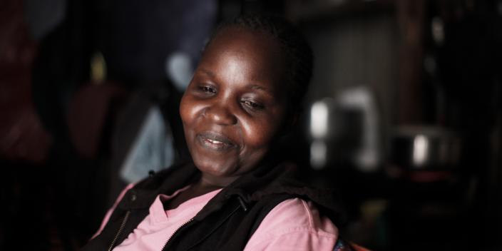 Grace Ondieke, a mother of 3, sits in her house in Mukuru informal settlement, in Nairobi, Kenya. Photo Credit: Sam Tarling 