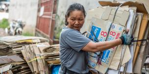 Ms. Thong shows her waste cart