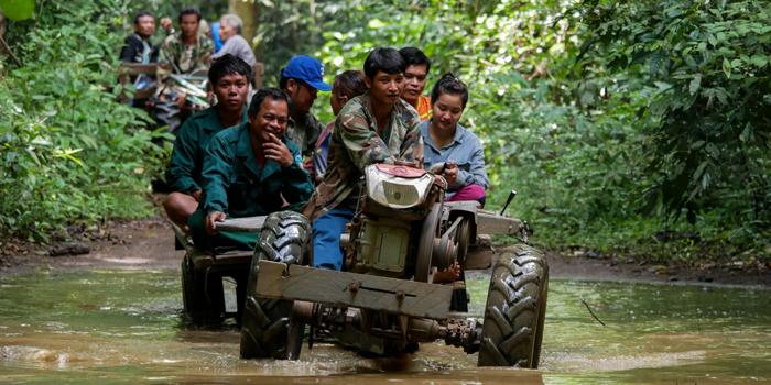 a tractor crossing river