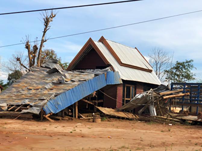 Sanamxay - Damaged home Sanamxay - Damaged home