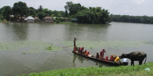 A wooden boat rescuing people