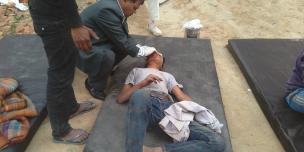 An injured man is treated effectively at the Public Health Centre in Changunarayan just an hour after the April earthquake thanks to disaster preparedness - Credit: PHC Team