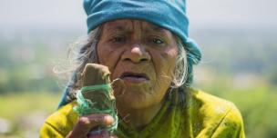 San Nani Magarati, an elderly widow from Changunarayan, who lost her house after the earthquake - Credit: Martin Grahovski/Oxfam