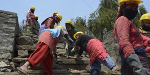 Women of Dakchinkali busy in removing mud from Kamal Pokhari -  Credit : Lucia de Vries/Oxfam 