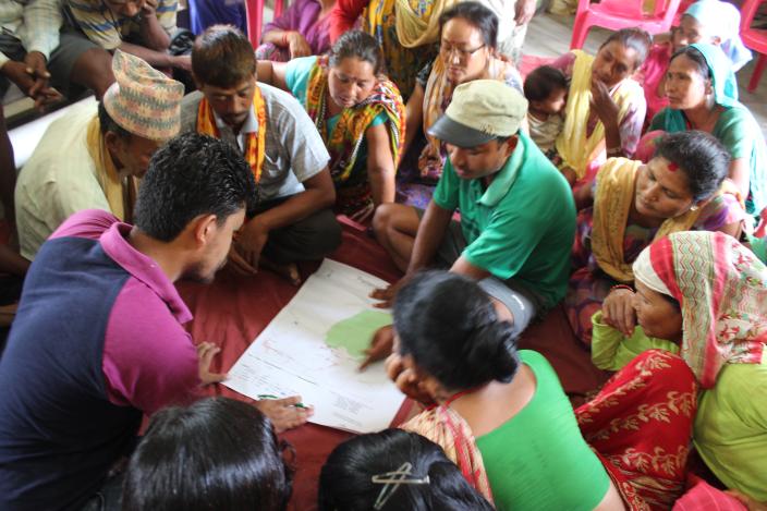 Preparing a village map as part of making by-laws - Credit: Rasna Dhakal/Oxfam