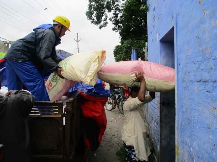 Oxfam distributing food