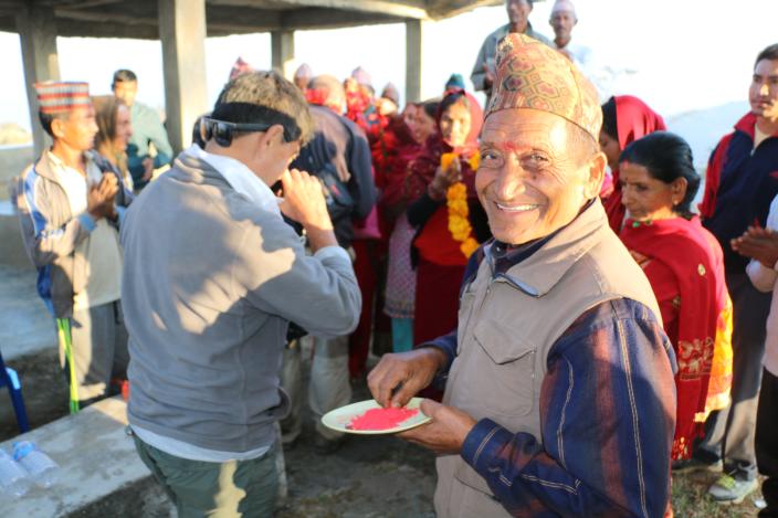 A smiling man in Kerauja