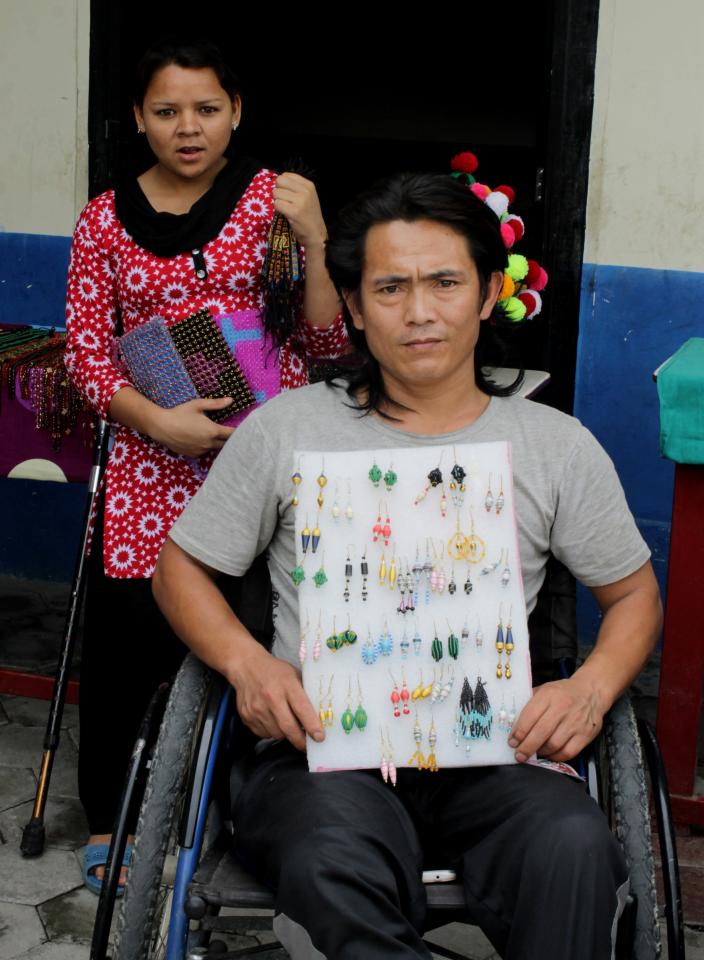 A producer displaying jewellery he made