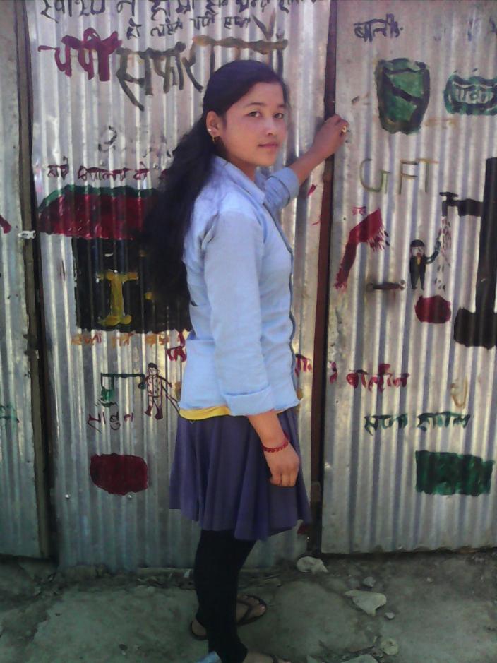 Samjhana in front of the female friendly toilet - Credit Sushmita Acharya/Oxfam.jpg Samjhana in front of the female friendly toilet - Credit Sushmita Acharya/Oxfam.jpg