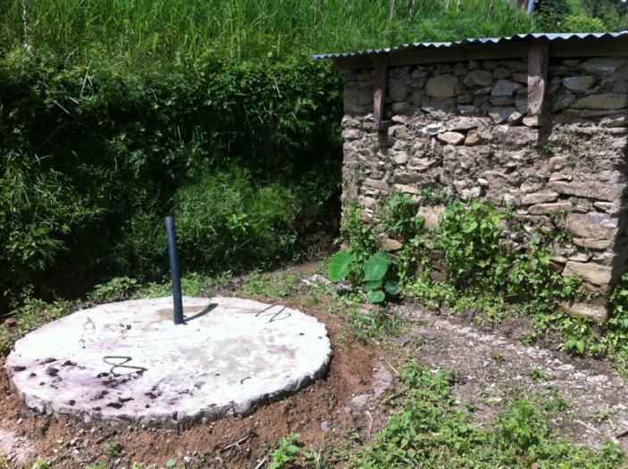 Septic tank constructed next to Taman's toilet