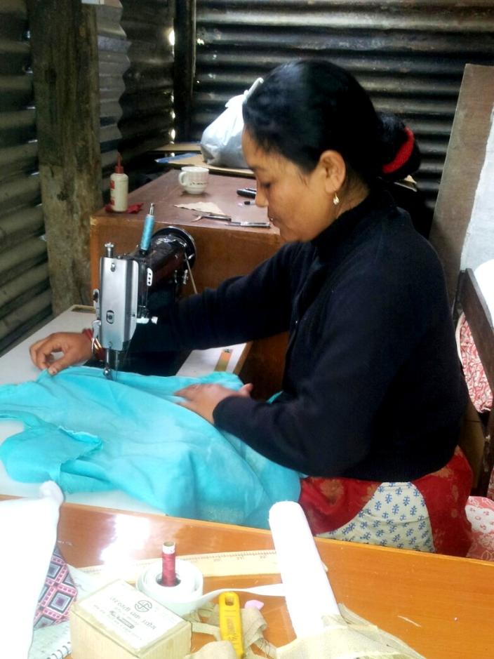 sabita with her new sewing machine sabita with her new sewing machine