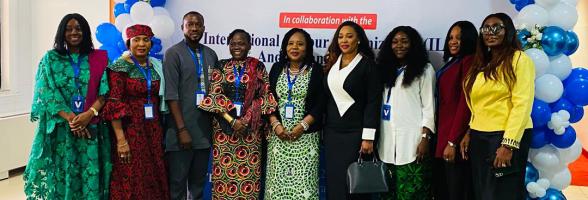 Stakeholders from Oxfam, the Federal Ministry of Labour and Employment (FMLE), and the International Labour Organization (ILO) posing together on stage at the National World of Work Gender Policy re-validation meeting on October 2nd, 2025.