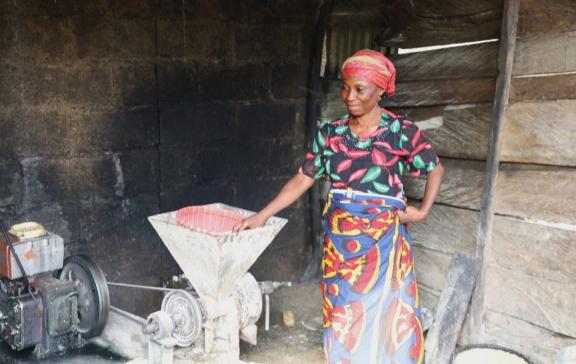 Miracle Ali working with her grinding machine